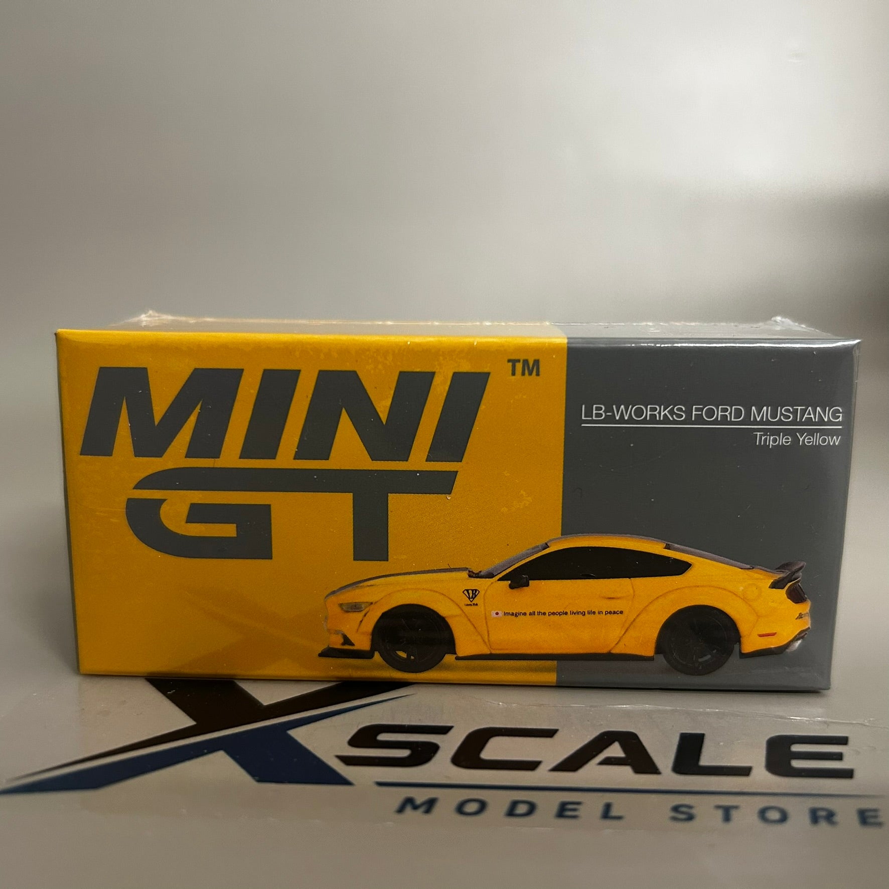 Mini GT 1/64 #1077 Ford LB Works Mustang Yellow